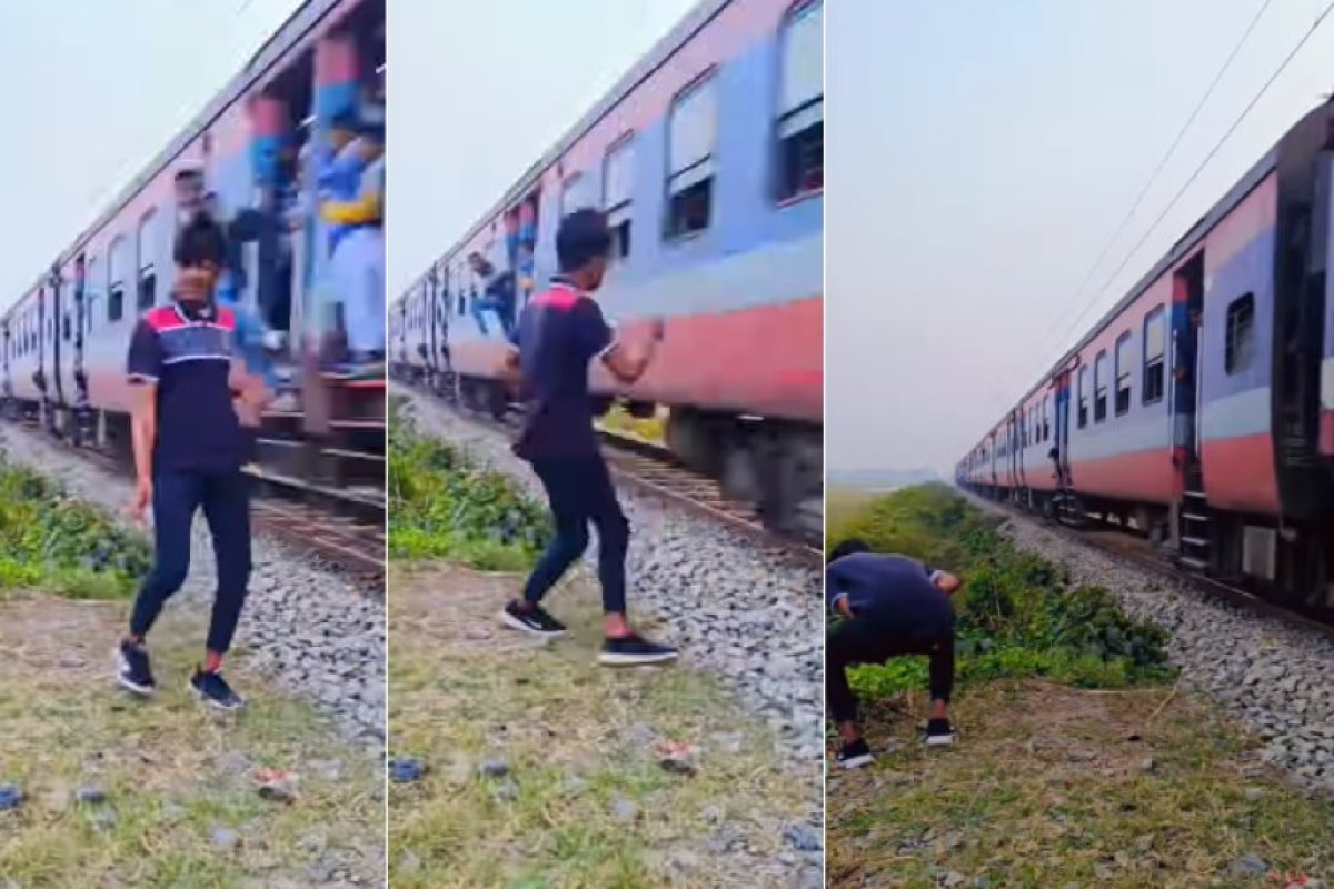Viral News: वायरल रील में खतरनाक स्टंट- रेलवे ट्रैक पर रील बनाते समय यात्री ने शख्स को मारी लात।