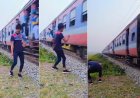 Viral News: वायरल रील में खतरनाक स्टंट- रेलवे ट्रैक पर रील बनाते समय यात्री ने शख्स को मारी लात। 