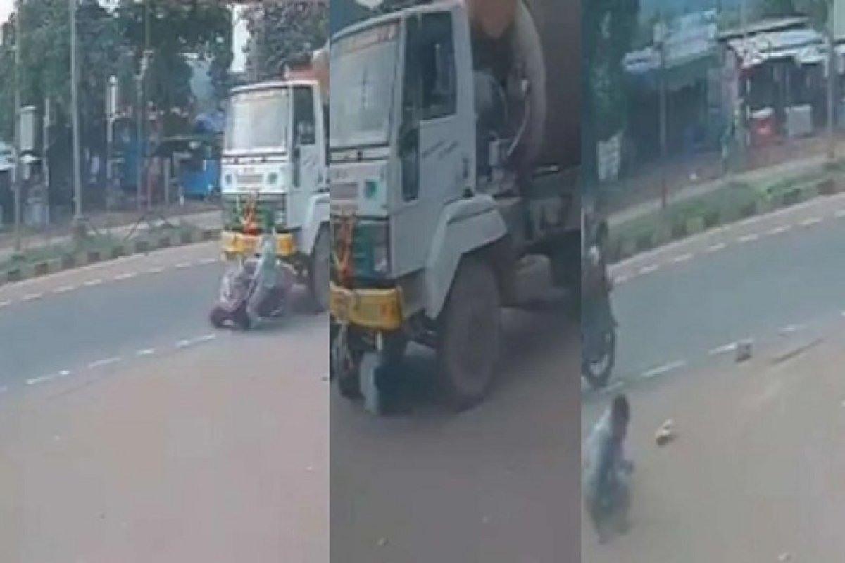 Andhra Pradesh: ट्रक के नीचे आया बाइक सवार, चमत्कारिक ढंग से बची जान, वीडियो देखकर हर कोई हुआ हैरान।