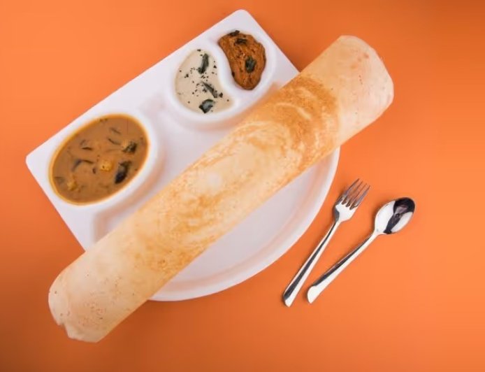 नाश्ते में शामिल करें मक्के के आटे का इंस्टेंट डोसा, कम समय में तैयार होने वाला यह व्यंजन है सेहत और स्वाद का खजाना।